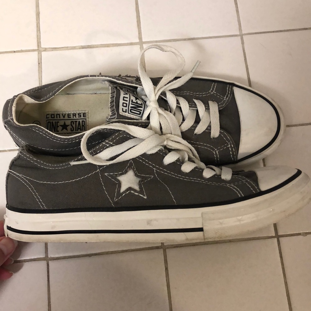 Gray Converse One-Stars low cut shoes